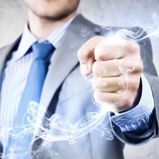 Why do Founding CEOs struggle with “being firm?” Close up image of businessman clenching fume in fist
